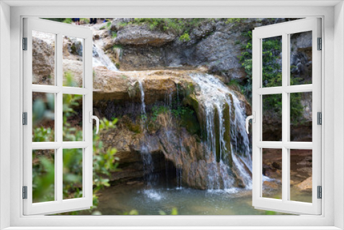 Fototapeta Naklejka Na Ścianę Okno 3D - Waterfall in Catalonia surrounded by beautiful forests