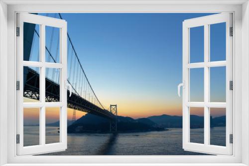 Fototapeta Naklejka Na Ścianę Okno 3D - 下関から北九州を望む関門橋の夜明け