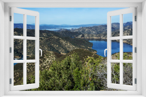 Fototapeta Naklejka Na Ścianę Okno 3D - Aerial view of Lake Berryessa from the Blue Ridge Trail, Stebbins Cold Canyon, on a sunny day, featuring the surrounding blue oak woodland and the cove marina in the fall of 2017