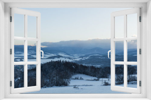 Fototapeta Naklejka Na Ścianę Okno 3D - Trees covered with snow on a winter mountain