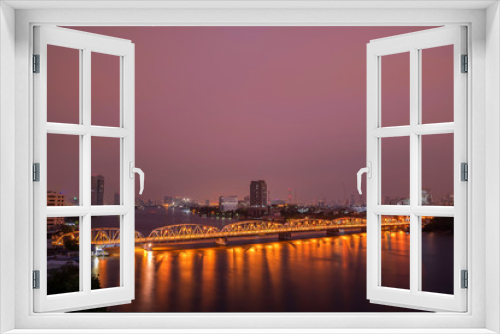 Old bridge in Bangkok at night.