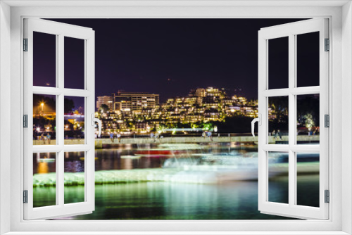 Fototapeta Naklejka Na Ścianę Okno 3D - Long esposure landscape of luminous Budva at night, hive hotel, Montenegro.