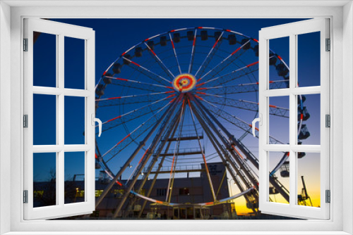 Fototapeta Naklejka Na Ścianę Okno 3D - GENOA, ITALY, NOVEMBER 27, 2017 - Ferris wheel with colored lights in 