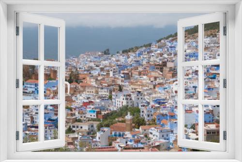 Fototapeta Naklejka Na Ścianę Okno 3D - Traditional moroccan courtyard in Chefchaouen blue city medina in Morocco, architectural details in Blue town Chaouen. Typical blue walls and colorful flower pots.