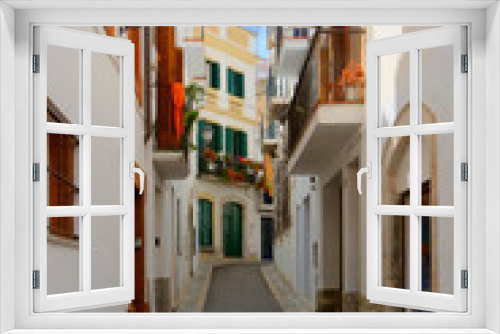 Fototapeta Naklejka Na Ścianę Okno 3D - Narrow street in Sitges, Spain