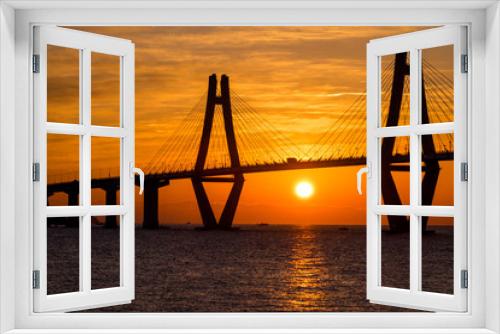 Fototapeta Naklejka Na Ścianę Okno 3D - Sunrise through the Geoje Bridge