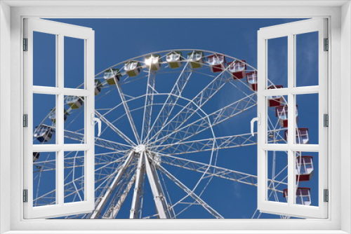 Fototapeta Naklejka Na Ścianę Okno 3D - Grande roue dans le ciel bleu