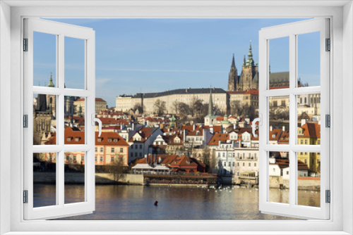 Fototapeta Naklejka Na Ścianę Okno 3D - View on the winter Prague gothic Castle above River Vltava in the sunny Day, Czech Republic