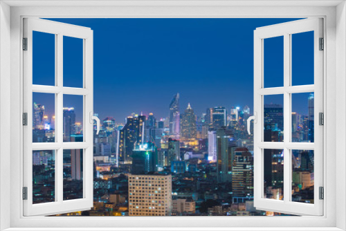 Fototapeta Naklejka Na Ścianę Okno 3D - Bangkok city skyline, downtown, business district, hotel, residential building and office building at night.