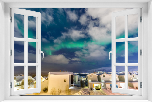 Fototapeta Naklejka Na Ścianę Okno 3D - the polar lights over the city of Tromso