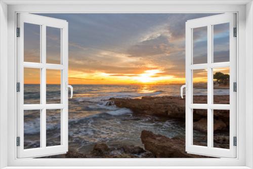 Fototapeta Naklejka Na Ścianę Okno 3D - The calm sea in a very cloudy sunset