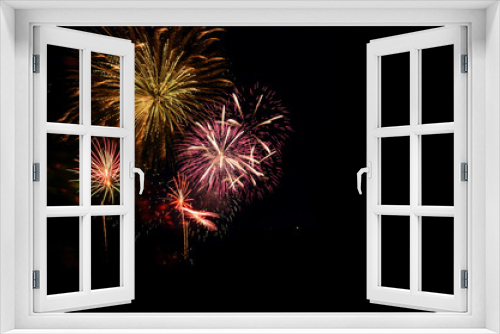 Fototapeta Naklejka Na Ścianę Okno 3D - Fireworks celebration and the midnight sky background.