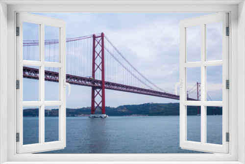 Fototapeta Naklejka Na Ścianę Okno 3D - The 25 de Abril Bridge in Lisbon, Portugal