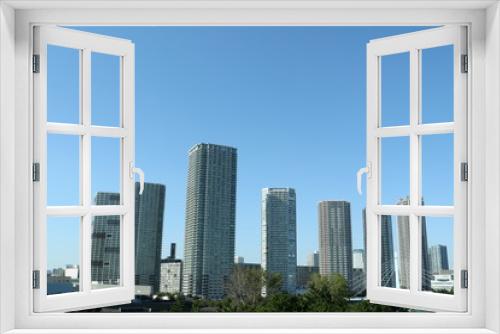 Fototapeta Naklejka Na Ścianę Okno 3D - 青空と豊洲の街並み