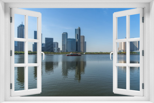Fototapeta Naklejka Na Ścianę Okno 3D - modern city waterfront downtown skyline,China.