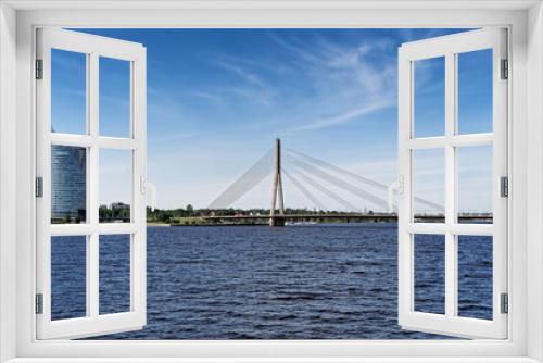 Fototapeta Naklejka Na Ścianę Okno 3D - Vansu Brücke in Riga über Fluss Daugava, Lettland