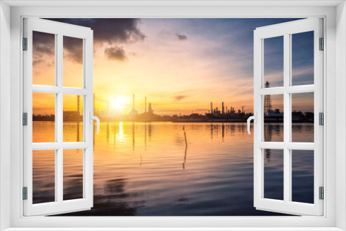 Fototapeta Naklejka Na Ścianę Okno 3D - Oil and gas industry - refinery at Sunrise - factory - petrochemical plant with reflection over the river