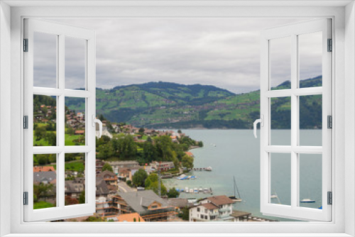 Fototapeta Naklejka Na Ścianę Okno 3D - Spiez town view from hill at Switzerland