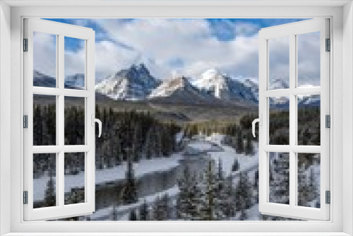 Fototapeta Naklejka Na Ścianę Okno 3D - Canadian Rockies train and snowy mountan view in Winter