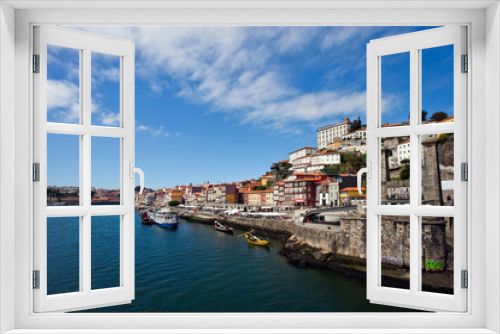 Fototapeta Naklejka Na Ścianę Okno 3D - Panorama of the city of Porto in Portugal on the river bank on a clear summer day