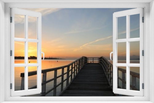Fototapeta Naklejka Na Ścianę Okno 3D - romantischer Sonnenaufgang am Steg an der Ostsee