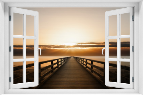 Fototapeta Naklejka Na Ścianę Okno 3D - Steg in den Sonnenuntergang