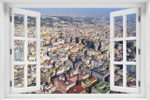 Fototapeta Naklejka Na Ścianę Okno 3D - Aerial view of the hill and residential district of Vomero in Naples, Italy. Many are the buildings built in the narrow streets of the city. 