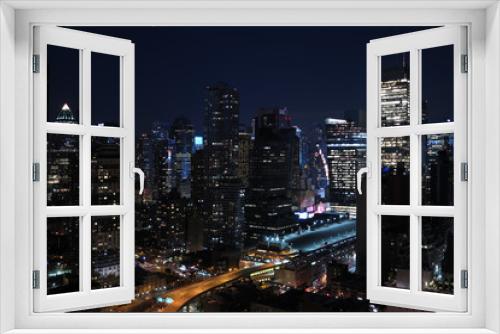 Fototapeta Naklejka Na Ścianę Okno 3D - Panorama of skyscrapers of New York City, Manhattan.  View of night midtown of Manhattan