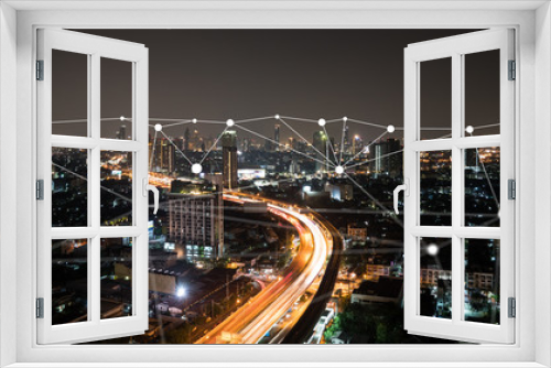 Fototapeta Naklejka Na Ścianę Okno 3D - Night time city scape with connecting dots for networking and communication.