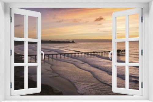 Fototapeta Naklejka Na Ścianę Okno 3D - Dramatic Sunset Sky, Scripps Pier and La Jolla Shores Beach below UCSD north of San Diego California