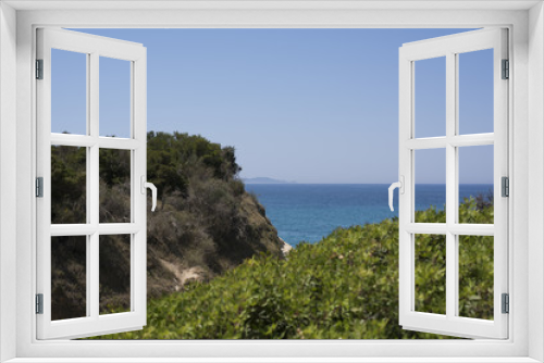 Fototapeta Naklejka Na Ścianę Okno 3D - View of the beautiful blue sea of Corfu in Greece