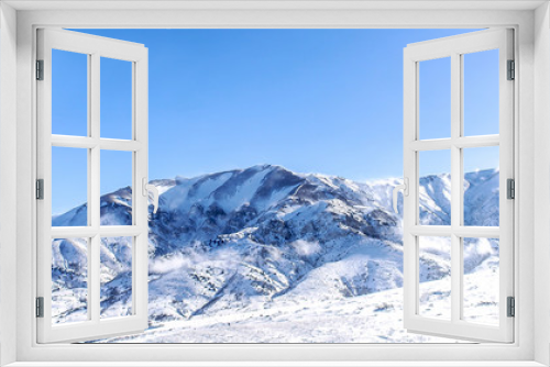 Fototapeta Naklejka Na Ścianę Okno 3D - Beautiful Snow-covered mountains in winter in sunny weather