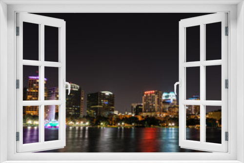 Fototapeta Naklejka Na Ścianę Okno 3D - Downtown Orlando at Lake Eola at Night
