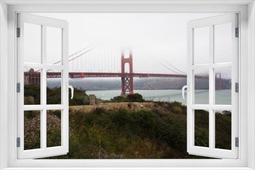 Fototapeta Naklejka Na Ścianę Okno 3D - Golden Gate Bridge in heavy fog in San Francisco in the USA
