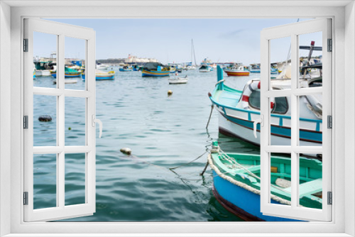 Fototapeta Naklejka Na Ścianę Okno 3D - Traditional boats at Marsaxlokk Harbor in Malta