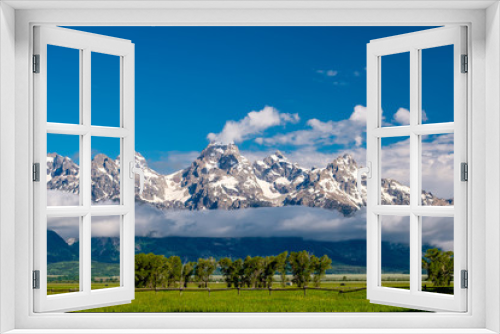 Fototapeta Naklejka Na Ścianę Okno 3D - Grand Teton Mountains with low clouds