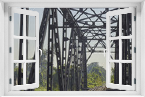 Fototapeta Naklejka Na Ścianę Okno 3D - narrow gauge railroad line and bridge, Bangkok, Thailand