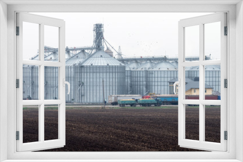 Fototapeta Naklejka Na Ścianę Okno 3D - Elevator for grain storage. Grain dryer. Agricultural complex..