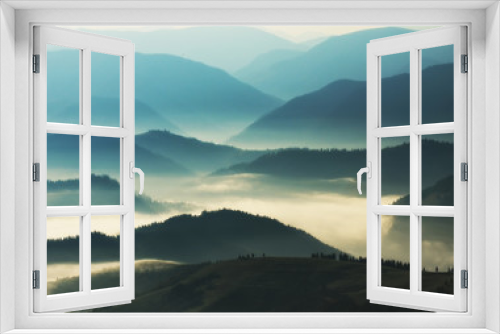 Fototapeta Naklejka Na Ścianę Okno 3D - silhouettes of mountains. autumn morning in the Carpathian mountains. foggy dawn