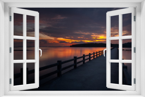 Fototapeta Naklejka Na Ścianę Okno 3D - The bridge in beautiful view on sea at sunrise