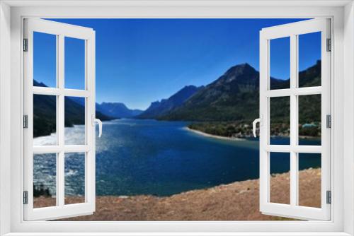 Fototapeta Naklejka Na Ścianę Okno 3D - Panoramic Waterton Lake. Peace Park, the first of its kind in the world. Waterton is known for its chain of lakes, including the large Upper and Middle Waterton. 