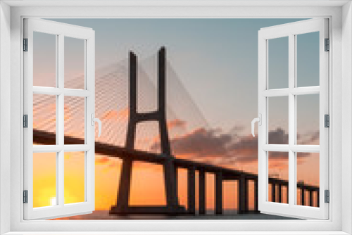 Fototapeta Naklejka Na Ścianę Okno 3D - Vasco da Gama Bridge at sunrise, Lisbon, Portugal