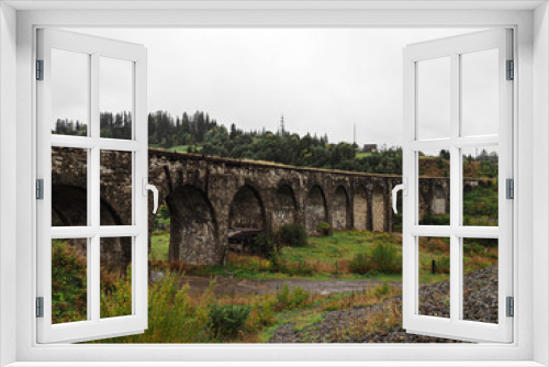 Fototapeta Naklejka Na Ścianę Okno 3D - old austrian bridge at the Carpatian mountains view from down