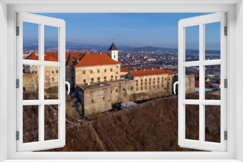 Fototapeta Naklejka Na Ścianę Okno 3D - Beautiful panoramic aerial view to Palanok Castle at sunset and the city of Mukachevo