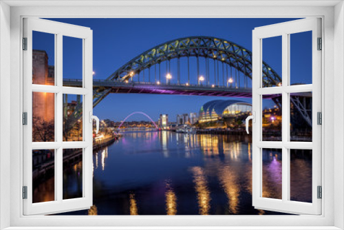 Fototapeta Naklejka Na Ścianę Okno 3D - NEWCASTLE UPON TYNE, TYNE AND WEAR/UK - JANUARY 20 : View of the Tyne and Millennium Bridges at dusk in Newcastle upon Tyne, Tyne and Wear on January 20, 2018