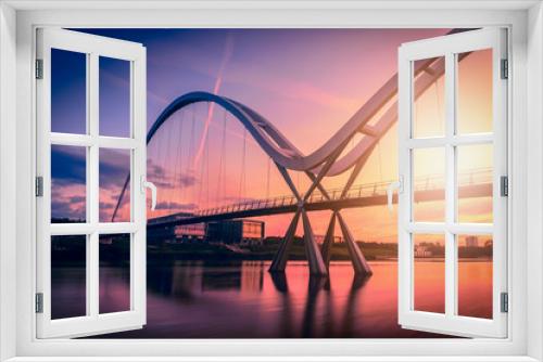Fototapeta Naklejka Na Ścianę Okno 3D - Infinity Bridge on dramatic sky at sunset in Stockton-on-Tees, UK.