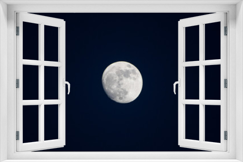 Fototapeta Naklejka Na Ścianę Okno 3D - Blue moon on the dark blue sky