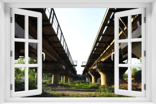 Fototapeta Naklejka Na Ścianę Okno 3D - Steel bridge on the river in structure