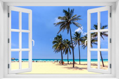 Fototapeta Naklejka Na Ścianę Okno 3D - vacation on the beach on the hot Caribbean islands with green palms, yellow sand, blue sky