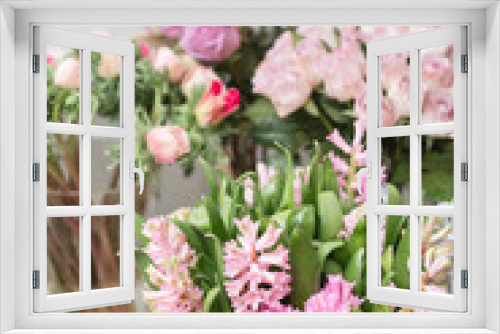 Fototapeta Naklejka Na Ścianę Okno 3D - Flower shop concept. Different varieties fresh spring flowers in refrigerator room for flowers. Bouquets on shelf, florist business.